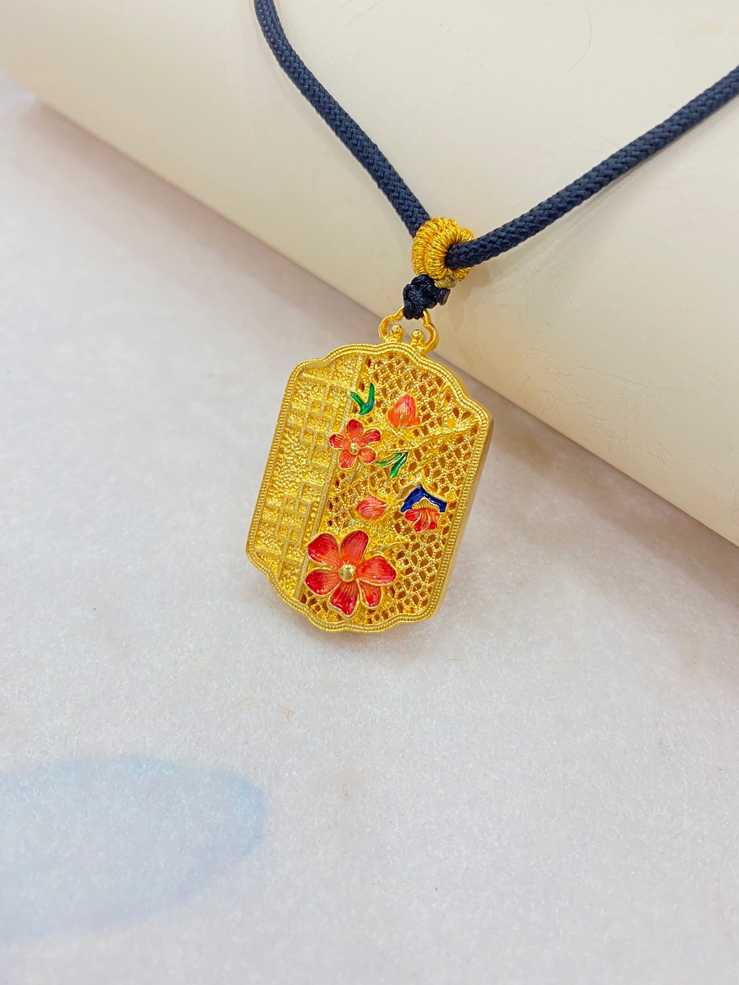 Flowering enamel pendant