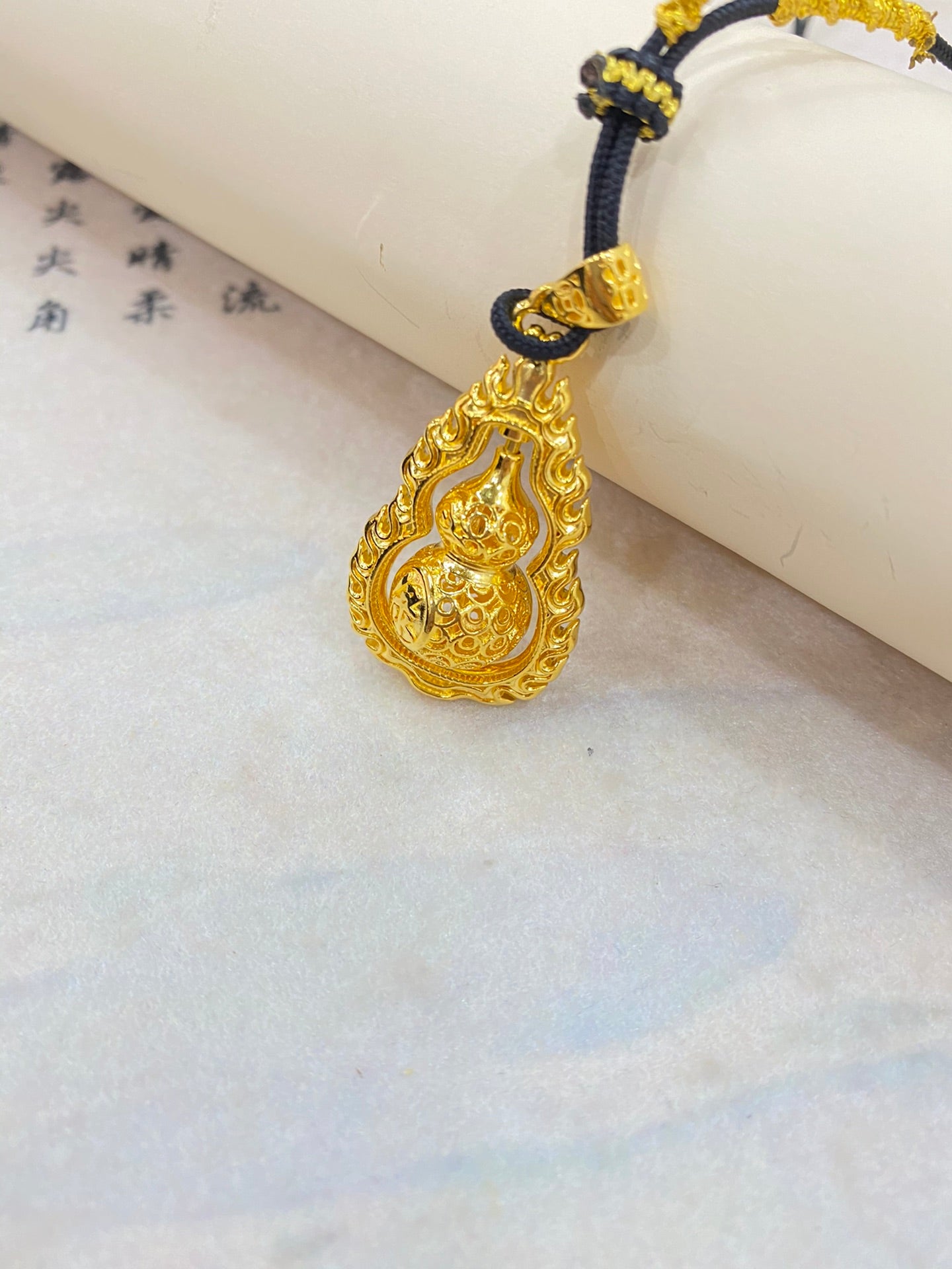 Flame gourd pendant