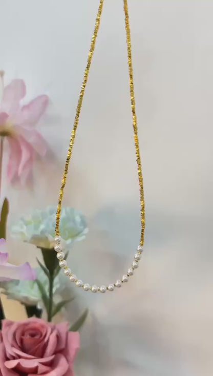 Shiny golden small pearl necklace